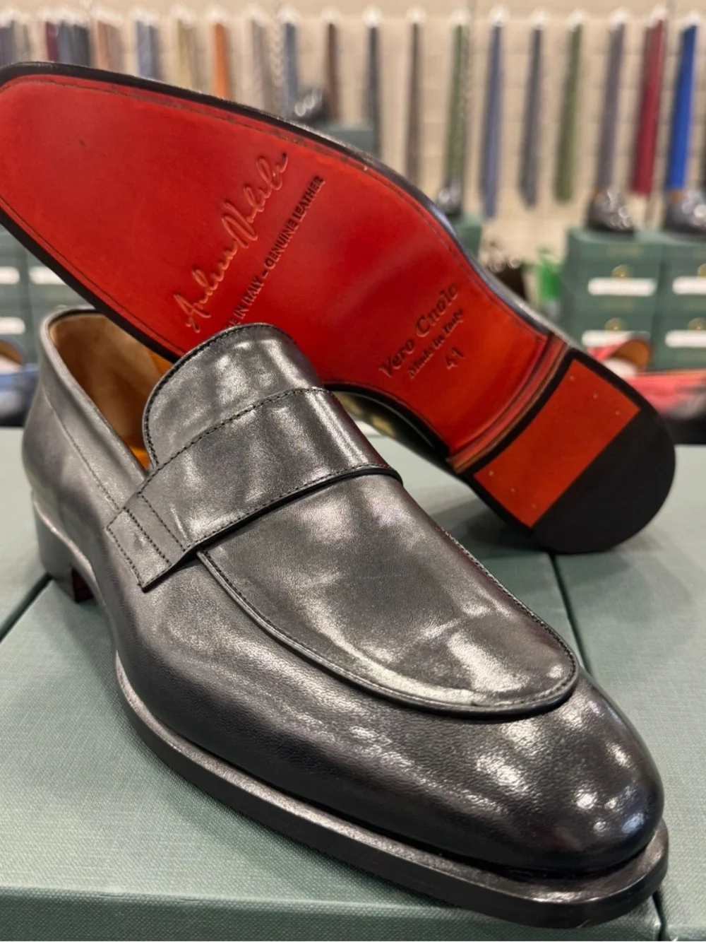 Classic Black Leather Men's Penny Loafers with patent red button